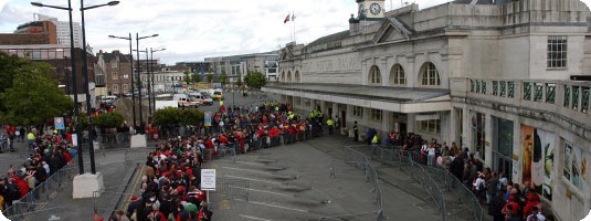 Likely after a match, people queuing outside of Cardiff Central Train Station. Photo from http://www.arrivatrainswales.co.uk/SpecialEvents/.
