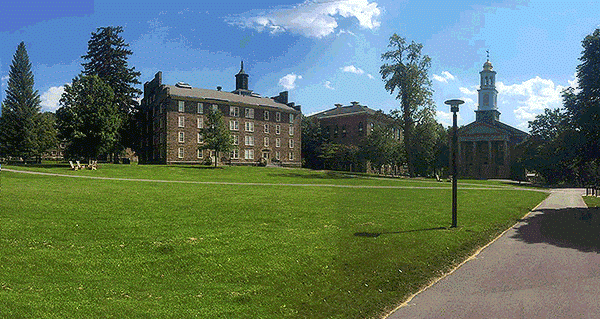 A GIF of alternating images: the current Academic Quad, a rendering of the future quad with trees growing on it 