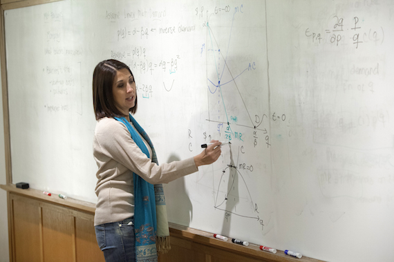 Professor Carolina Castilla teaches in a classroom