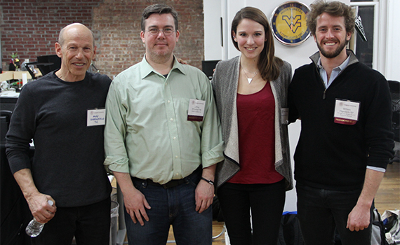 (Left to right) Thought Into Action founder Andy Greenfield ’74, P’12, digital technology network volunteer Jeff O’Connell ’94, Amanda Brown ’15, and Thought Into Action Executive Director Wills Hapworth ’07 during Colgate’s Hackathon on Saturday, March 14