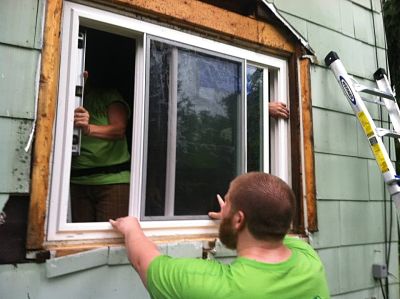 Brendan Walsh works with the Impact Project to help homeowners with repairs.